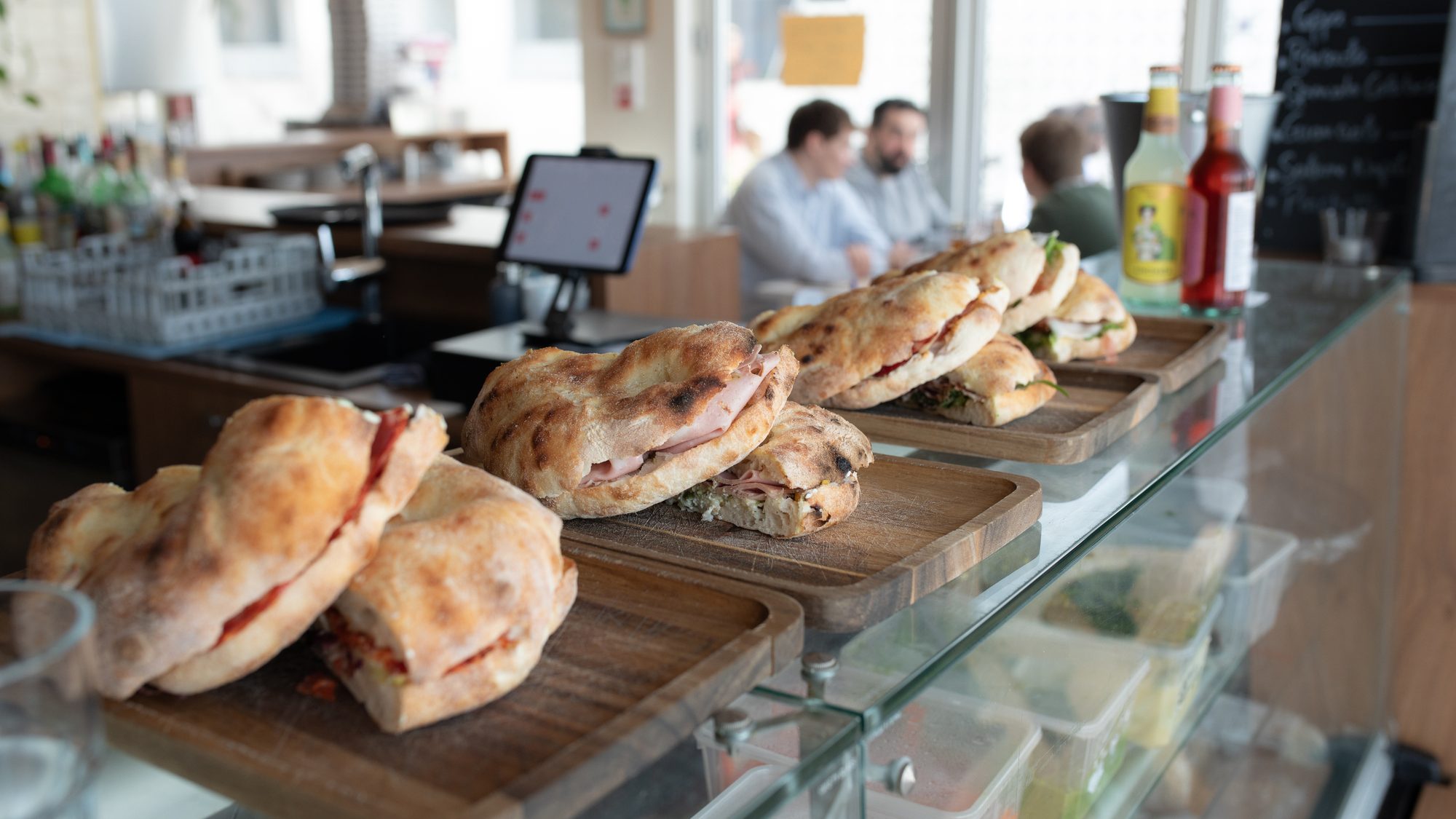 Filled focaccia to take away on the counter at Toscanacci, Pantin